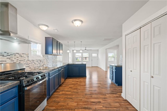 2914 Debra, Corpus Christi, TX 78418 - kitchen with a peninsula, appliances with stainless steel finishes, and blue cabinetry