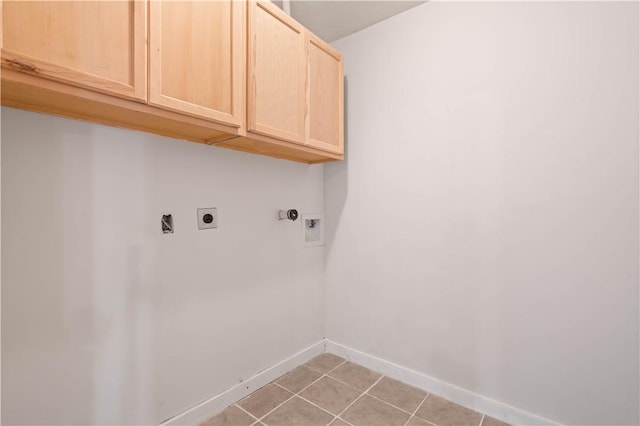 2914 Debra, Corpus Christi, TX 78418 - clothes washing area featuring hookup for an electric dryer, hookup for a washing machine, cabinet space, and baseboards