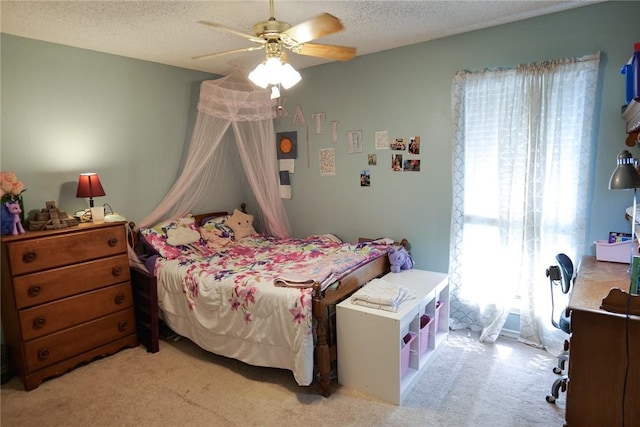 14929 Red River Dr, Corpus Christi, TX 78410 - carpeted bedroom with a ceiling fan and a textured ceiling