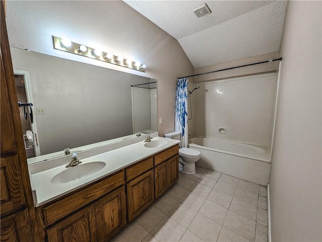 14929 Red River Dr, Corpus Christi, TX 78410 - full bathroom featuring vaulted ceiling, tile patterned floors, shower / bathtub combination with curtain, double vanity, and a textured ceiling