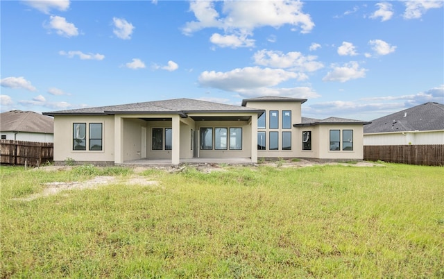 758 Buffalo Creek Dr, Corpus Christi, TX 78415 - back of house with stucco siding, a fenced backyard, and a patio