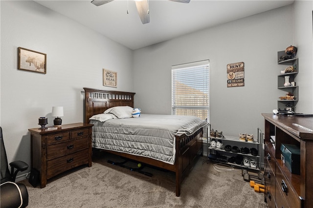 bedroom with ceiling fan and light carpet