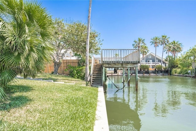 dock area featuring a water view and stairs