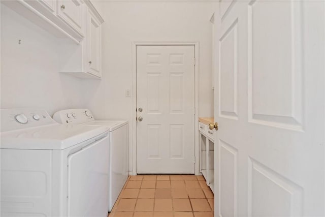 washroom with separate washer and dryer, cabinet space, and light tile patterned floors