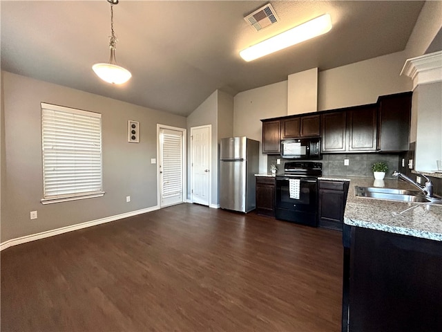 kitchen with dark wood-type flooring, dark brown cabinetry, black appliances, sink, and pendant lighting