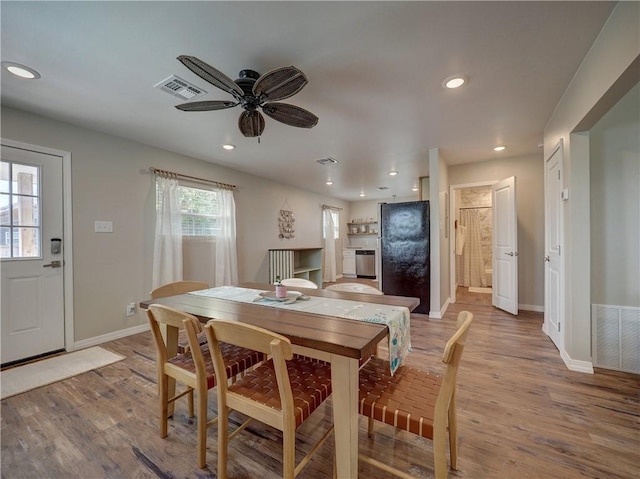 dining area featuring light hardwood / wood-style flooring and ceiling fan