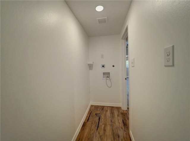 hallway with wood-type flooring