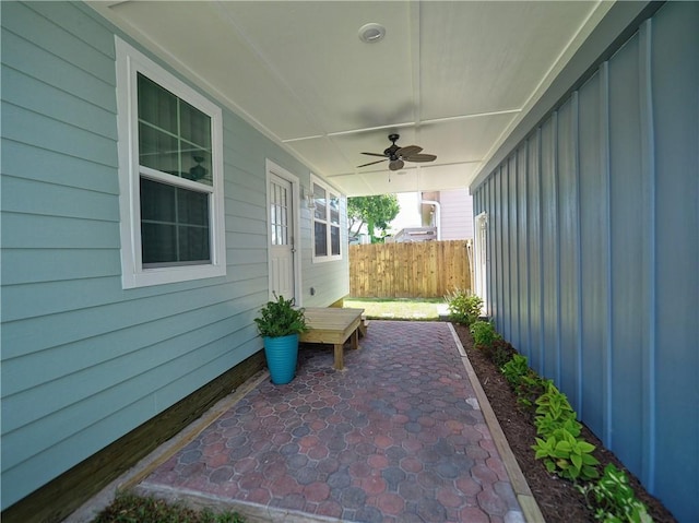 view of patio / terrace featuring ceiling fan