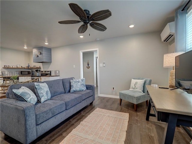 living room with ceiling fan, dark hardwood / wood-style floors, and a wall unit AC