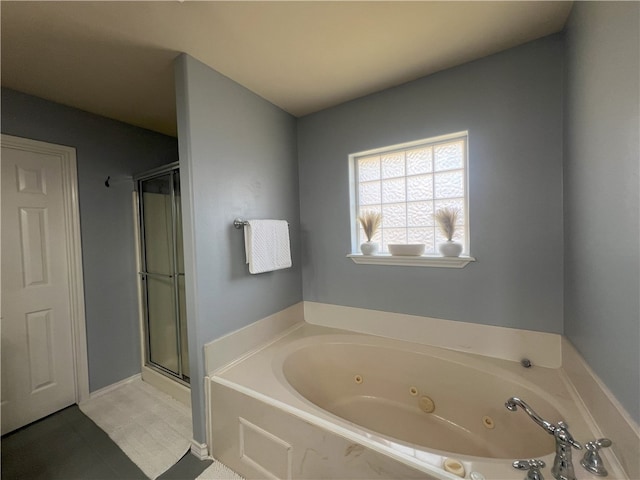 6317 Sir Jack St, Corpus Christi, TX 78414 - bathroom with a jetted tub and a shower stall