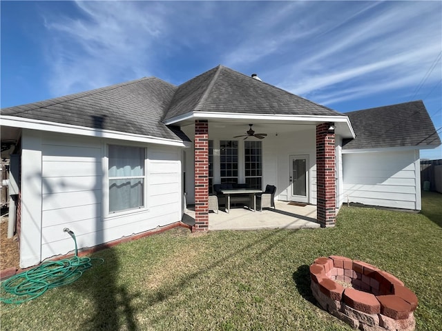 6317 Sir Jack St, Corpus Christi, TX 78414 - rear view of property with a ceiling fan, a yard, a patio area, and roof with shingles