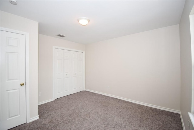 14435 Compass St Unit C, Corpus Christi, TX 78418 - unfurnished bedroom with carpet floors, baseboards, and a closet