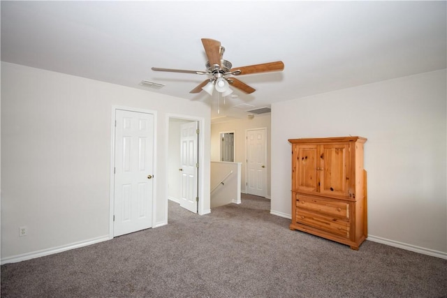 14435 Compass St Unit C, Corpus Christi, TX 78418 - unfurnished bedroom featuring carpet floors, baseboards, and a ceiling fan