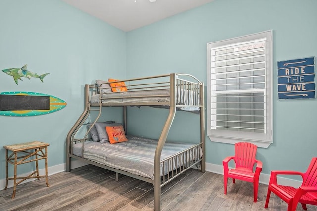 bedroom with hardwood / wood-style flooring