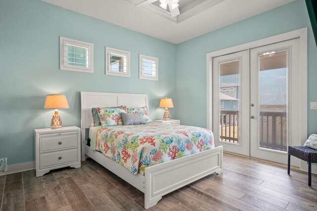 bedroom with french doors, ceiling fan, dark hardwood / wood-style flooring, and access to outside