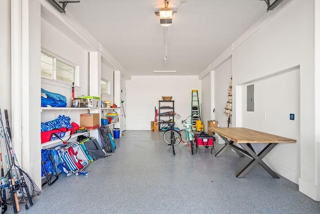 garage featuring a garage door opener and electric panel