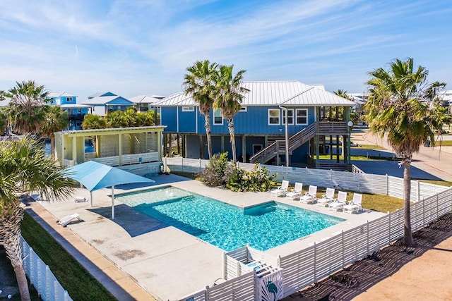 view of pool featuring a patio