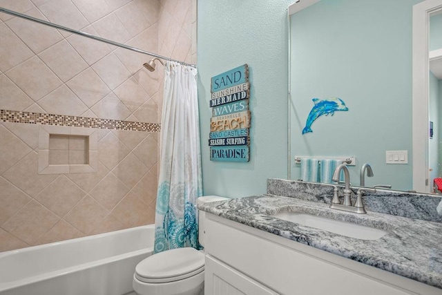 full bathroom featuring vanity, toilet, and shower / bath combo with shower curtain