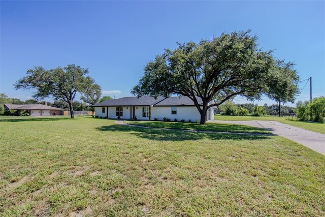 view of front of home with a front lawn