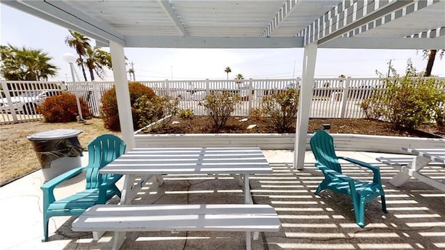 3938 Surfside Blvd Unit 1206, Corpus Christi, TX 78402 - view of patio featuring fence and a pergola