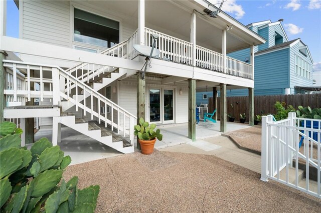 rear view of property featuring a patio