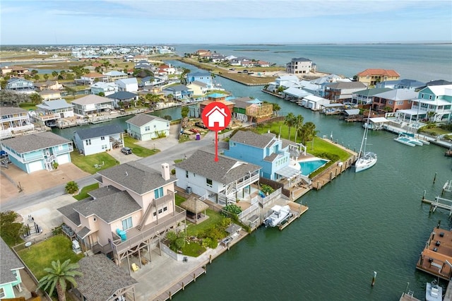 213 Port, Saint Claire, City By The Sea, TX 78336 - aerial perspective of suburban area featuring a large body of water