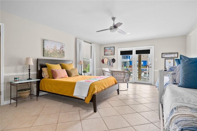 bedroom featuring access to outside, ceiling fan, and light tile patterned flooring