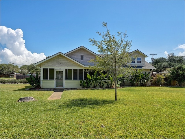 view of front of house with a front lawn