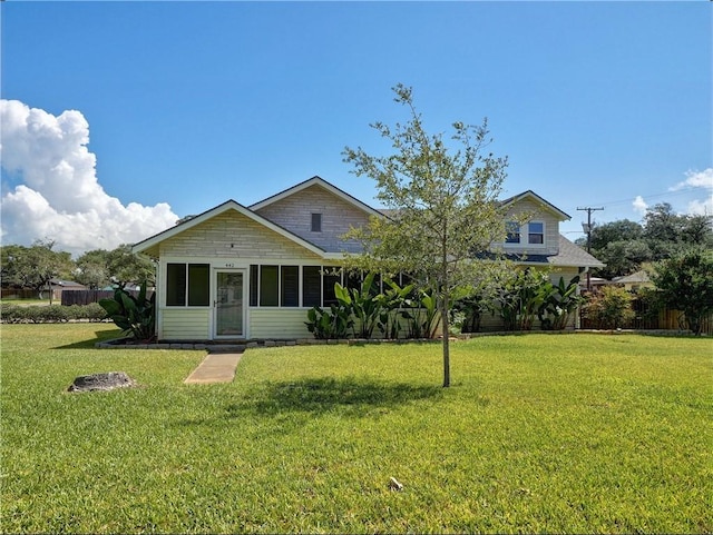 442 W Yoakum Ave, Aransas Pass, TX 78336 - back of house featuring a lawn