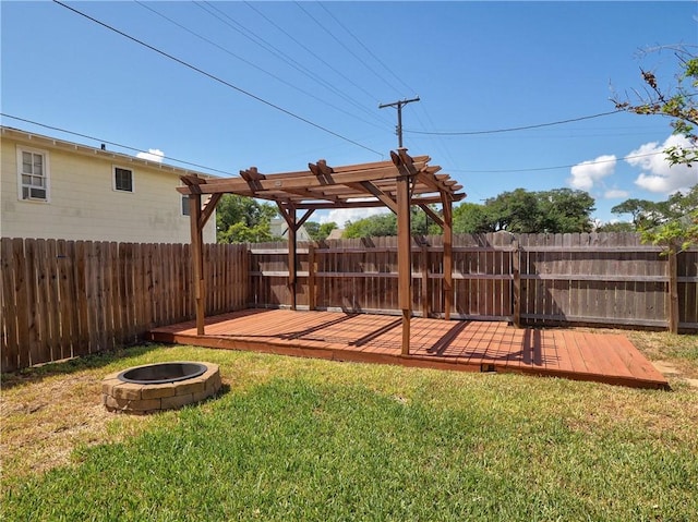 442 W Yoakum Ave, Aransas Pass, TX 78336 - view of yard with a fire pit, a wooden deck, and a pergola