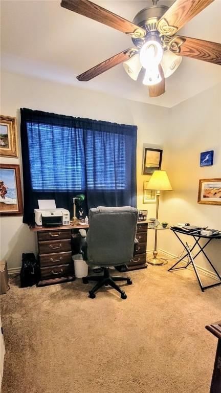 1017 Hickory Ave, Rockport, TX 78382 - home office featuring carpet flooring, ceiling fan, and baseboards