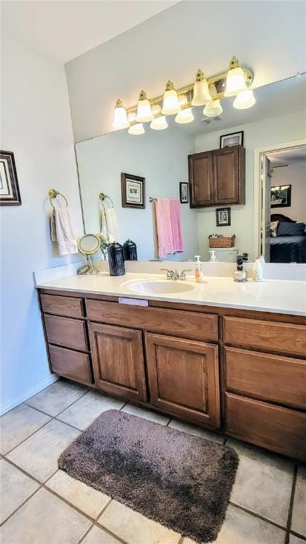 1017 Hickory Ave, Rockport, TX 78382 - bathroom featuring tile patterned flooring and vanity