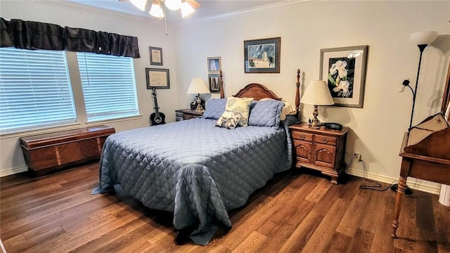 1017 Hickory Ave, Rockport, TX 78382 - bedroom featuring crown molding, wood finished floors, and baseboards