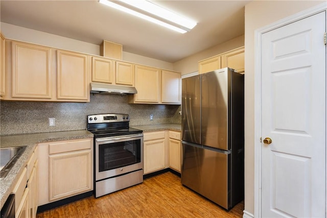 kitchen featuring under cabinet range hood, light wood-style flooring, appliances with stainless steel finishes, and light brown cabinetry