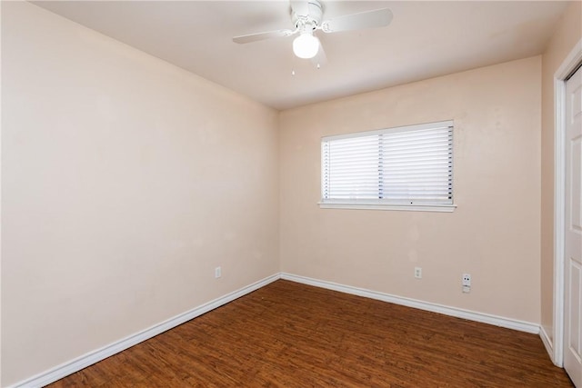 unfurnished room featuring wood finished floors, baseboards, and ceiling fan