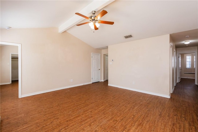 empty room featuring visible vents, baseboards, ceiling fan, lofted ceiling with beams, and wood finished floors