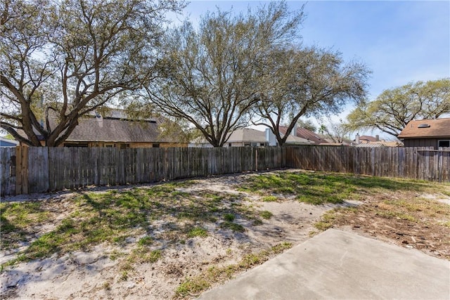 view of yard featuring a fenced backyard