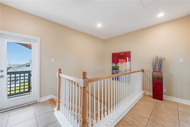 hallway with light tile patterned flooring