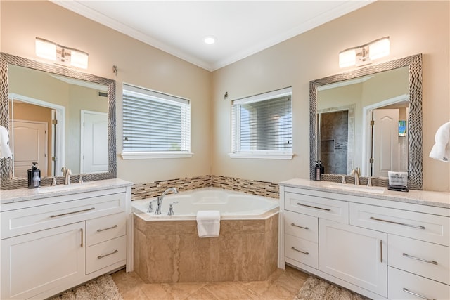 bathroom featuring a relaxing tiled tub, vanity, tile patterned floors, and ornamental molding