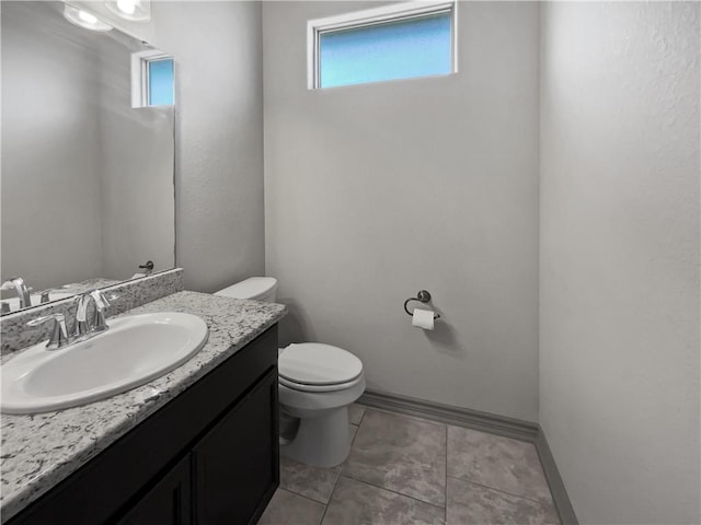 2105 Aquila St, Corpus Christi, TX 78414 - half bathroom with vanity and tile patterned floors