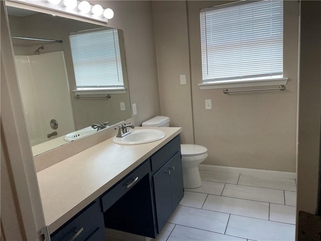 7029 Tamarron Ct, Corpus Christi, TX 78413 - full bath featuring vanity, toilet, tile patterned flooring, and tub / shower combination