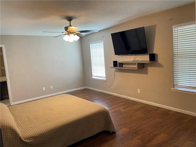 7029 Tamarron Ct, Corpus Christi, TX 78413 - bedroom featuring wood finished floors, baseboards, and a ceiling fan