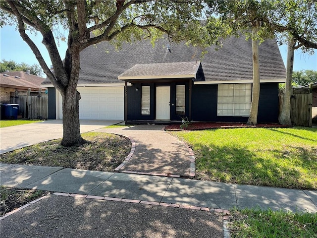 7029 Tamarron Ct, Corpus Christi, TX 78413 - view of front of property with a shingled roof, concrete driveway, and a garage