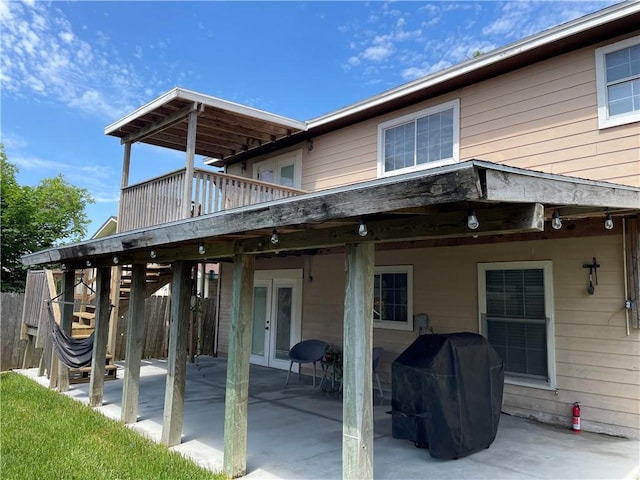 7029 Tamarron Ct, Corpus Christi, TX 78413 - back of property featuring a patio, french doors, stairway, and a wooden deck