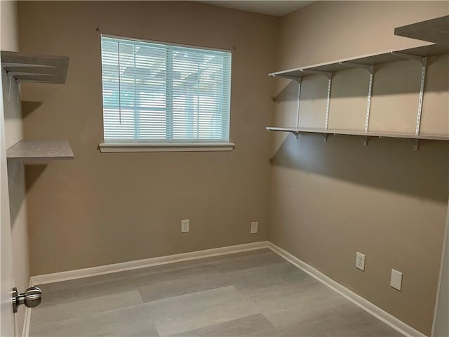 7029 Tamarron Ct, Corpus Christi, TX 78413 - washroom featuring light wood-style flooring and baseboards