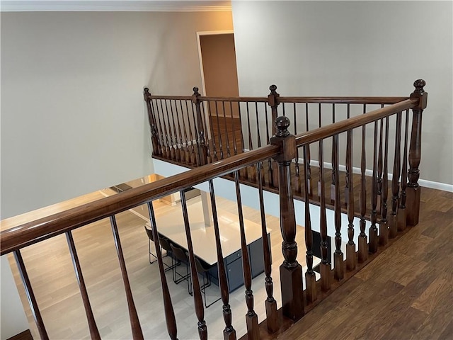7029 Tamarron Ct, Corpus Christi, TX 78413 - staircase with wood finished floors, baseboards, and ornamental molding
