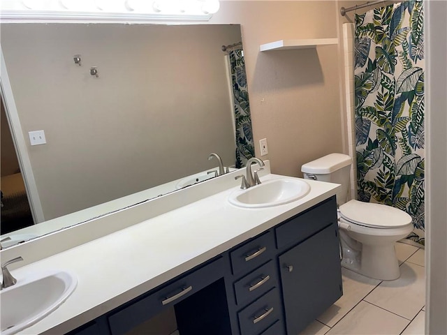 7029 Tamarron Ct, Corpus Christi, TX 78413 - bathroom with vanity, tile patterned floors, toilet, and curtained shower