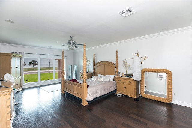 bedroom featuring ceiling fan, dark hardwood / wood-style floors, and ornamental molding