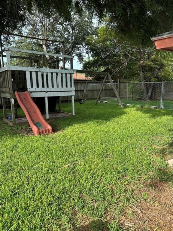 view of yard with a playground