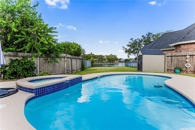 7601 Dijon Lake Dr, Corpus Christi, TX 78413 - view of swimming pool featuring a fenced backyard, a storage shed, and a pool with connected hot tub